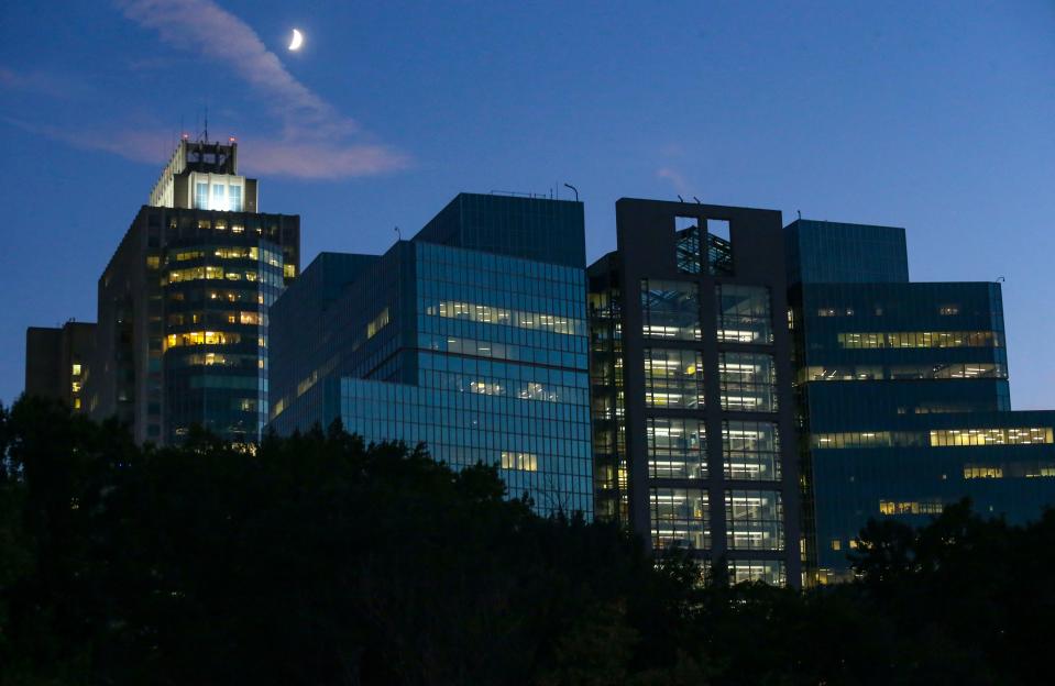 The moon glows over 1201 N. Market Street (the tallest building in Delaware) and 1313 N. Market Street, which is among the highest but sits squatter but wider. The I.M. Pei Building peeks in but is barely visible at left.