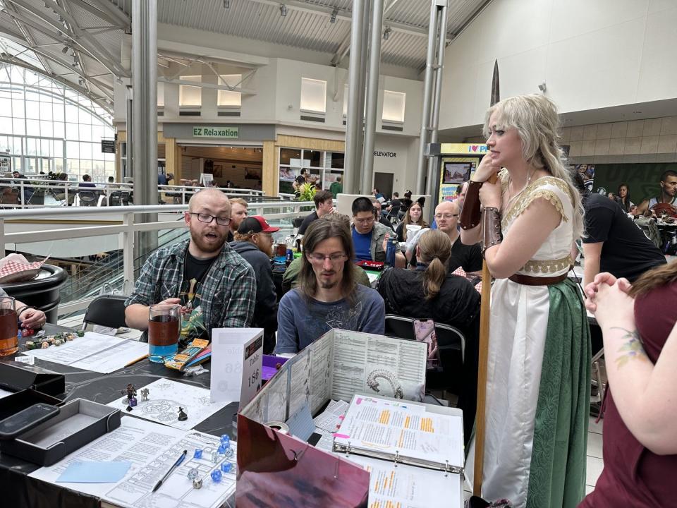General Janie Eastman talks to Dungeons and Dragons players during an official attempt to break a Guinness World Record on Saturday at Provo Towne Centre.