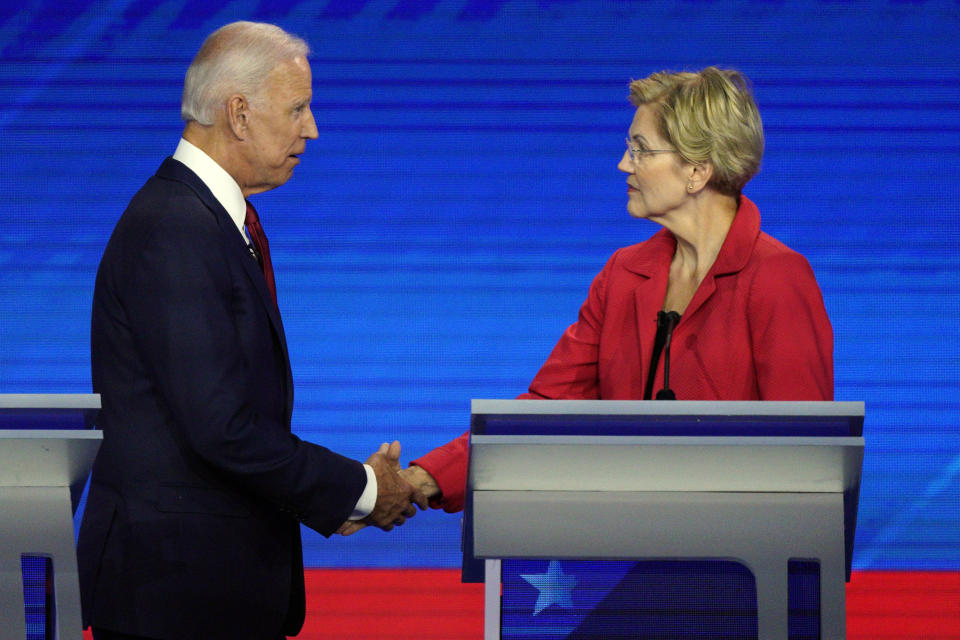 Democratic presidential candidates former Vice President Joe Biden, left, and Sen. Elizabeth Warren, D-Mass., shake hands Thursday, Sept. 12, 2019, after a Democratic presidential primary debate hosted by ABC at Texas Southern University in Houston. (AP Photo/David J. Phillip)