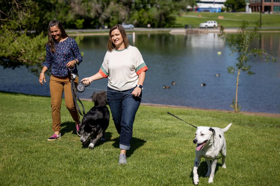 Salt Lake City Mayor Erin Mendenhall, left, and her dog Jack, and Salt Lake County Mayor Jenny Wilson and her dog Puddles, gather for a press conference on water safety at Sugar House Park in Salt Lake City on Thursday, June 1, 2023. Officials are warning people and their pets to stay clear of rivers and creeks swollen by spring snowmelt. | Spenser Heaps, Deseret News