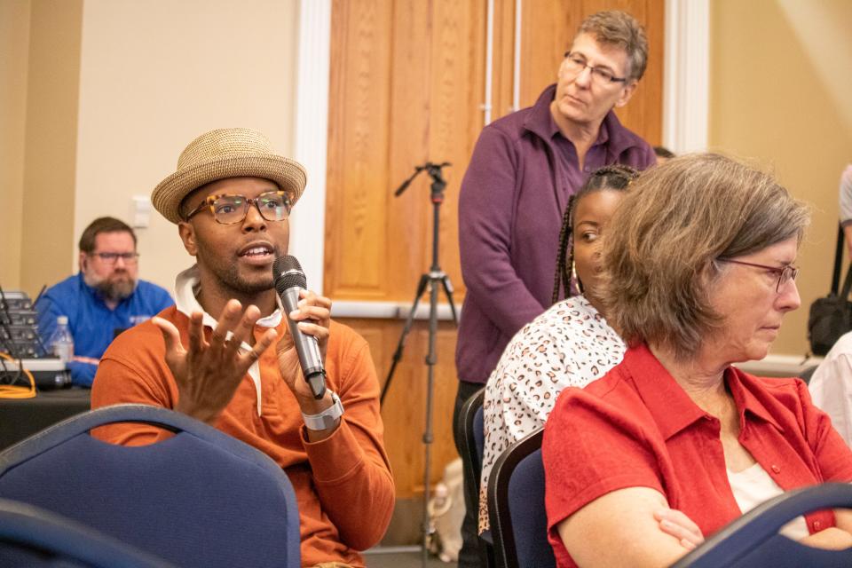 UF Associate Professor of Dance Trent Williams asks a question during an open forum discussion at Emerson Alumni Hall in Gainesville, Fla., on Monday, Oct. 10, 2022.