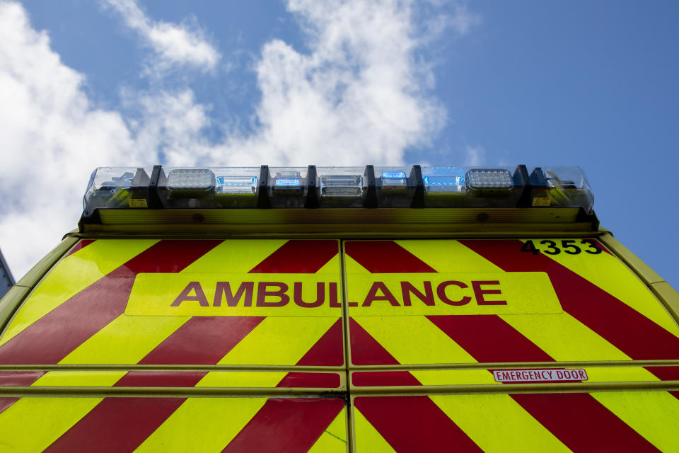 Lights flash on an ambulances outside the Hollymore Ambulance Hub of the West Midlands Ambulance Service in Birmingham where a coronavirus antibody testing program is taking place.