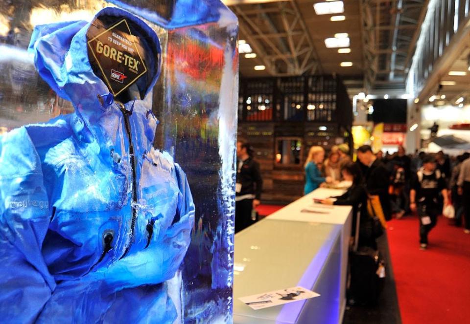 A waterproof Gore-Tex coat displayed in a block of ice at an outdoor supplies shop