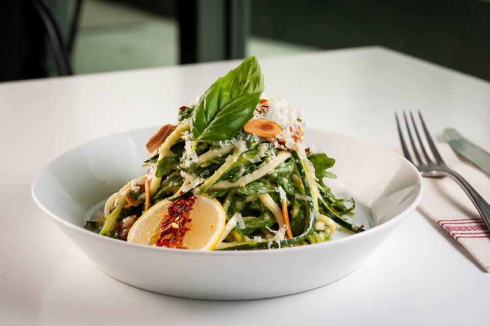 Another menu item is zucchine e rucola, with lemon-garlic olive oil, Parmesan and almonds.