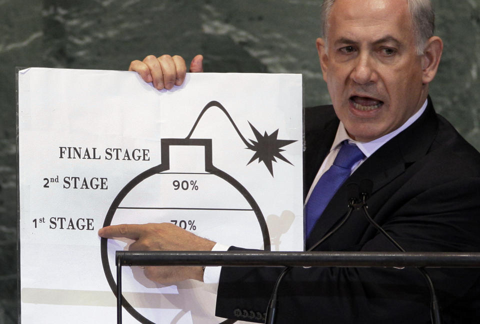 FILE - In this Sept. 27, 2012, file photo, Prime Minister Benjamin Netanyahu of Israel shows an illustration as he describes his concerns over Iran's nuclear ambitions during his address to the 67th session of the United Nations General Assembly at U.N. headquarters. Iran has often commanded center stage at the annual U.N. gathering of world leaders, turning the organization’s headquarters into an arena for arguments over the Persian Gulf’s daily complexities and hostilities. (AP Photo/Richard Drew, File)