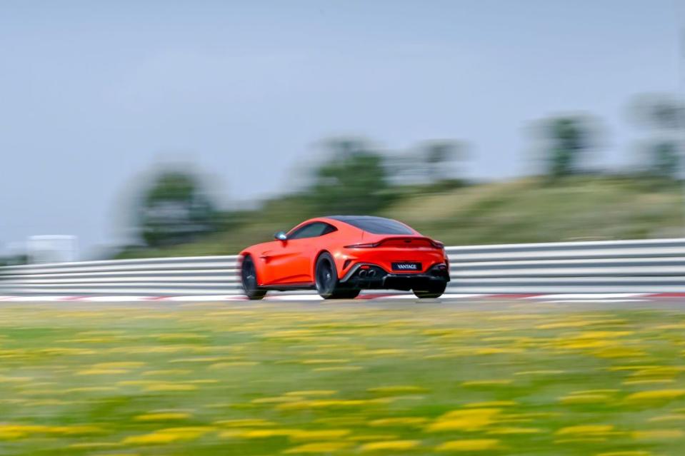 a red race car on a track