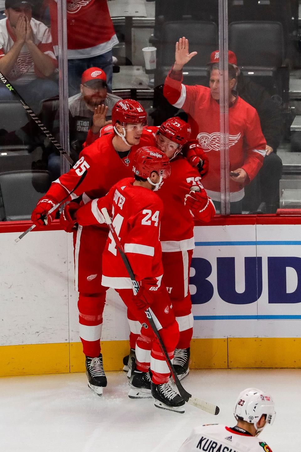 Detroit Red Wings left wing Adam Erne (73) celebrates a goal against Chicago Blackhawks with left wing Elmer Soderblom (85) during the first period of a preseason game at Little Caesars Arena in Detroit on Wednesday, Sept. 28, 2022.