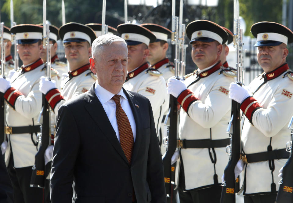 U.S. Defense Secretary James Mattis walks past an honor guard squad during a welcome ceremony upon his arrival at the government building in Skopje, Macedonia, Monday, Sept. 17, 2018. Mattis arrived in Macedonia Monday, condemning Russian efforts to use its money and influence to build opposition to an upcoming vote that could pave the way for the country to join NATO, a move Moscow opposes. (AP Photo/Boris Grdanoski)