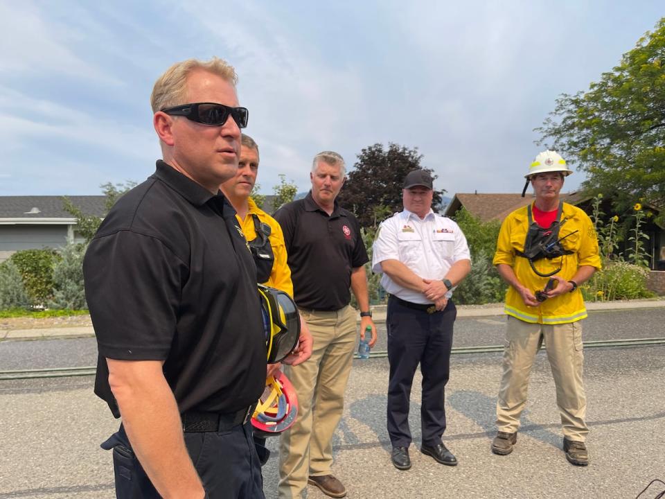 IAFF official Mike Carter, left, and Kamloops Fire Chief Ken Uzeloc, second from right, said that urban firefighters had to get trained on wildfires as the fire risk ramps up in Western Canada.