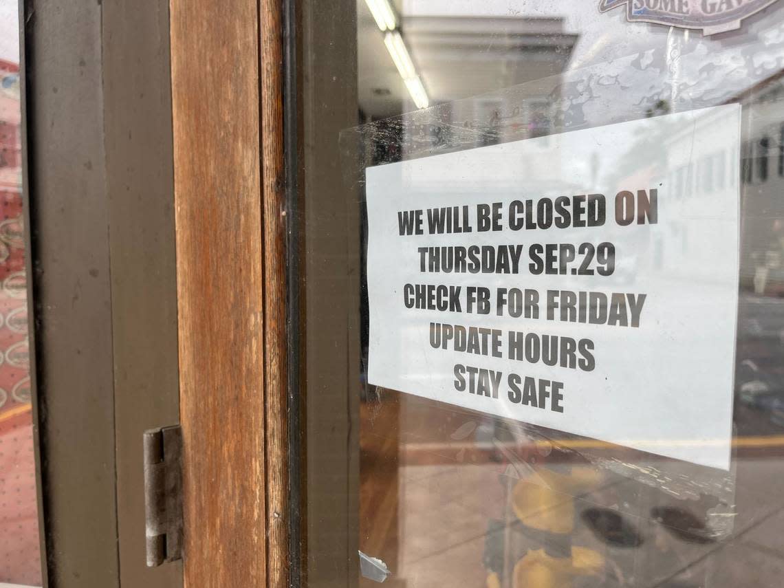 A sign tacked onto a Bay Street business storefront in Beaufort, South Carolina, on Thursday, Sept. 2022. Several businesses along the downtown’s main drag closed their doors in anticipation for Tropical Storm Ian.