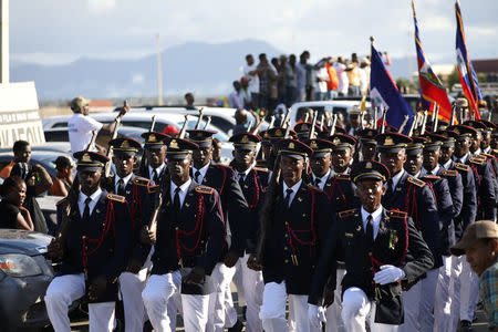 Members of the Haitian Armed Forces (FAD'H) parade in the streets of Cap-Haitien, Haiti, November 18, 2017. REUTERS/Andres Martinez Casares