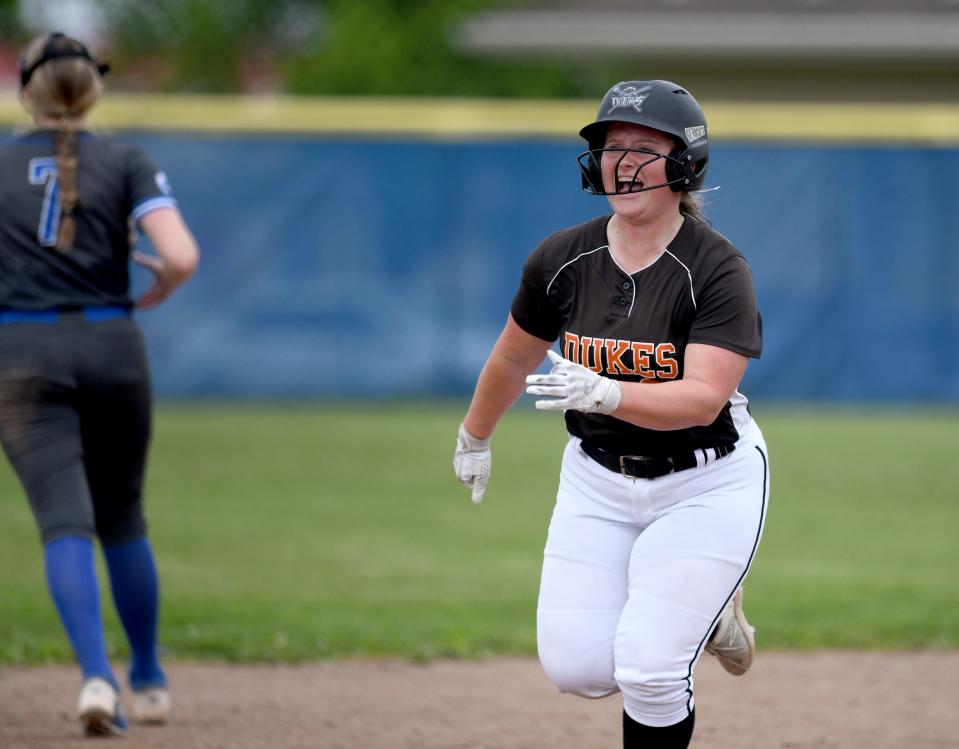 Marlington's Audrey Miller heads home on a Chelsea Miller triple in the third inning vs. Gilmour Academy in a district semifinal, Tuesday, May 14, 2024, at Hubbard High School.