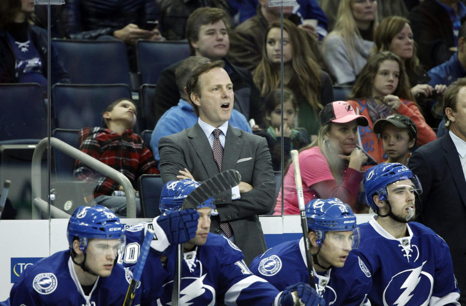 Jan 9, 2015; Tampa, FL, USA; Tampa Bay Lightning head coach Jon Cooper reacts on the bench against the Washington Capitals during the first period at Amalie Arena. (Kim Klement-USA TODAY Sports)