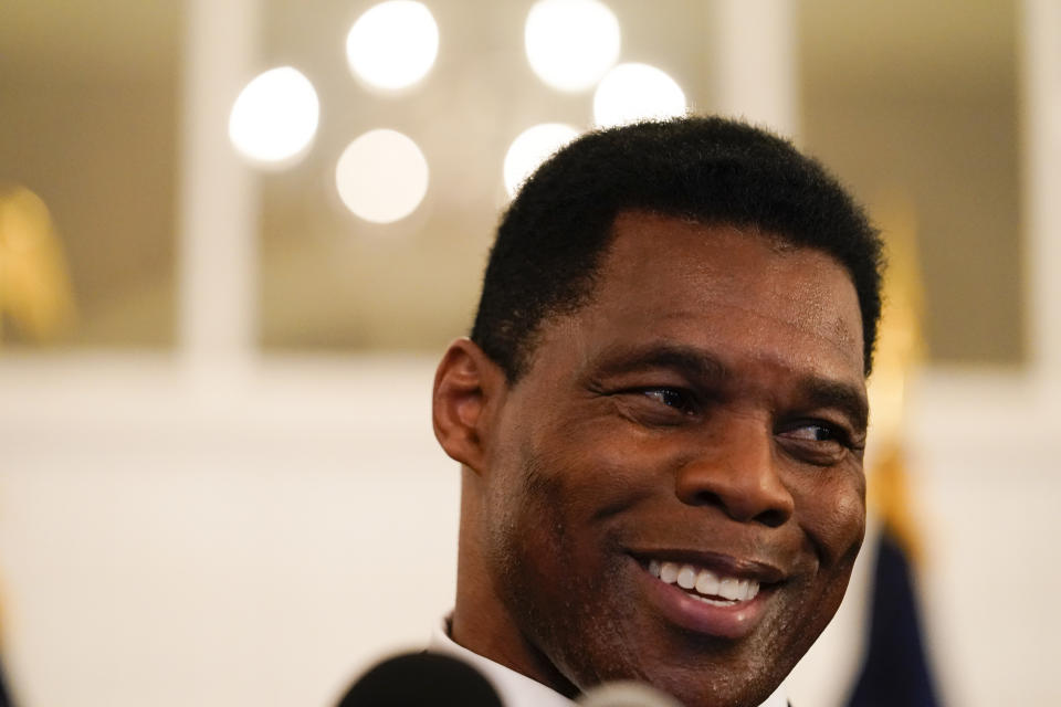 U.S. Senate candidate Herschel Walker speaks to supporters during an election night watch party, Tuesday, May 24, 2022, in Atlanta. Walker won the Republican nomination for U.S. Senate in Georgia's primary election. (AP Photo/Brynn Anderson)