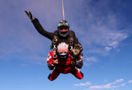 A thrill seeking great-gran has celebrated her 90th birthday - by taking to the air and SKYDIVING from 15,000 feet. Sprightly Patricia Baker said it felt "awesome" to plunge from a whopping three miles up in testing conditions. Brilliant photos and videos show the widowed gran-of-ten dressed in a red jumpsuit flying through the sky. Patricia said she "wasn't too worried" about the jump because she "keeps herself fit" by doing 50 sit ups every morning. And her main motivation was to raise some money for charity, she added.