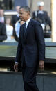 President Barack Obama walks past the north reflecting pool of the Sept. 11 memorial during 10th anniversary ceremonies at the site, Sunday, Sept. 11, 2011, in New York. (AP Photo/Justin Lane, Pool)