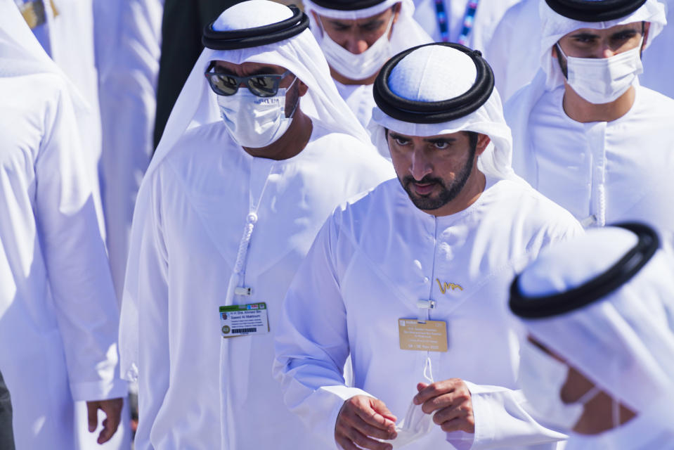 Sheikh Hamdan bin Mohammed Al Maktoum, the crown prince of Dubai, attends at the Dubai Air Show in Dubai, United Arab Emirates, Sunday, Nov. 14, 2021. The biennial Dubai Air Show opened Sunday as commercial aviation tries to shake off the coronavirus pandemic. (AP Photo/Jon Gambrell)