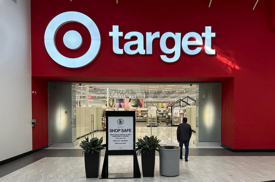 FILE - A shopper heads into a Target store on Jan. 11, 2024, in Lakewood, Colo. (AP Photo/David Zalubowskim File)