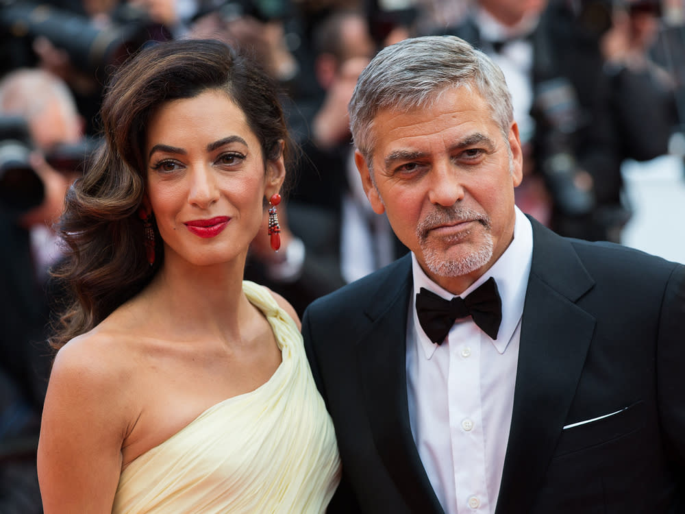 Amal und George Clooney beim Filmfestival in Cannes 2016 (Bild: magicinfoto/shutterstock.com)