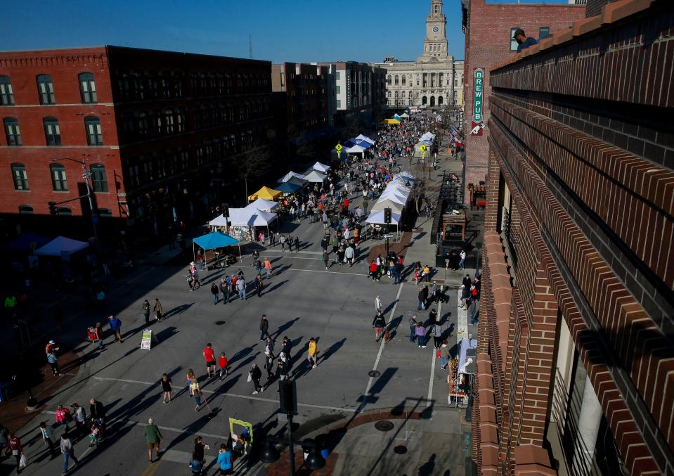 Thousands of market goers converged on downtown Des Moines during the opening day of the 2022 downtown Farmers' Market on Saturday, May 7.