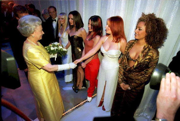 <p>This image is girl power goals. Each Spice Girl stayed true to their personal style with Victoria Beckham looking very ‘Posh’ whilst Mel B puts on a rather wild display. <i> [Photo: AFP/Getty Images]</i></p>