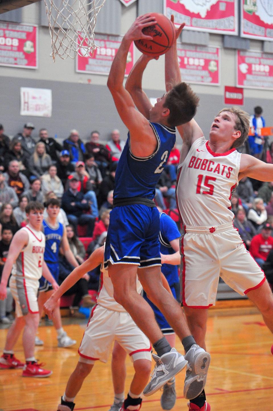 Norwayne's Justin Rupp gets his hand on the ball as Owen Riggenbach attacks for Chippewa.