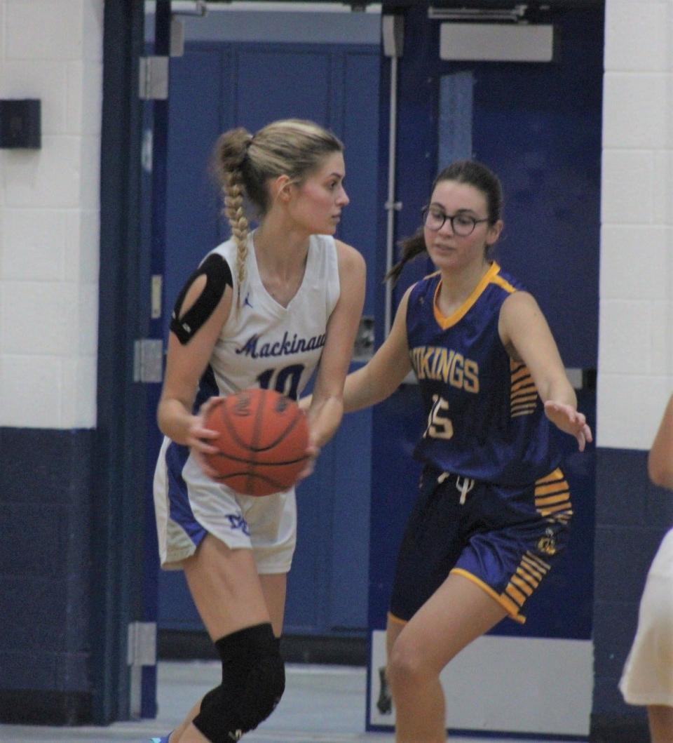 Madison Smith's (10) game-high 20 points helped lift the undefeated Mackinaw City girls to a big win at Boyne Falls on Monday.