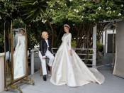 <p>Model and Victoria’s Secret Angel Miranda Kerr married Snapchat founder Evan Spiegel in their backyard in Los Angeles, in 2016. Inspired by Grace Kelly's iconic wedding gown, Kerr wore a Haute Couture gown designed by Christian Dior creative director, Maria Grazia Chiuri, appliquéd with embroidery inspired by Lily of the Valley.</p>