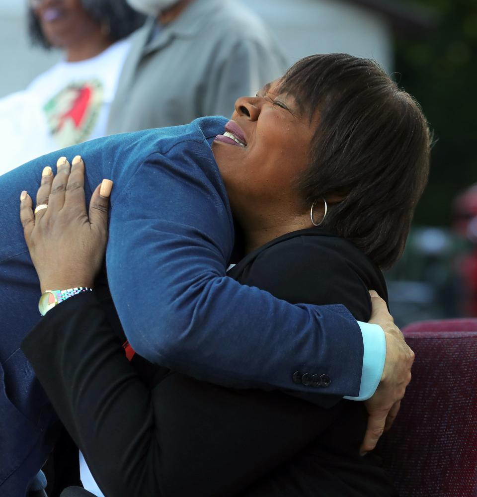 Pamela Walker, mother of the late Jayland Walker, embraces her attorney Bobby DiCello during a memorial for her son Thursday in Akron.