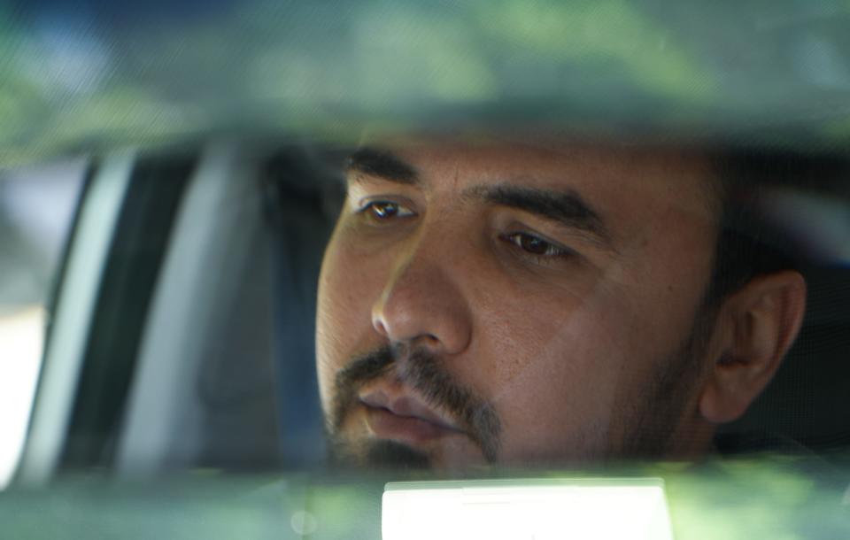 Shah Khan Sherzad, a former member of Afghanistan’s parliament, works as a Lyft driver. “Driving helps me to focus and stay calm,” he says.