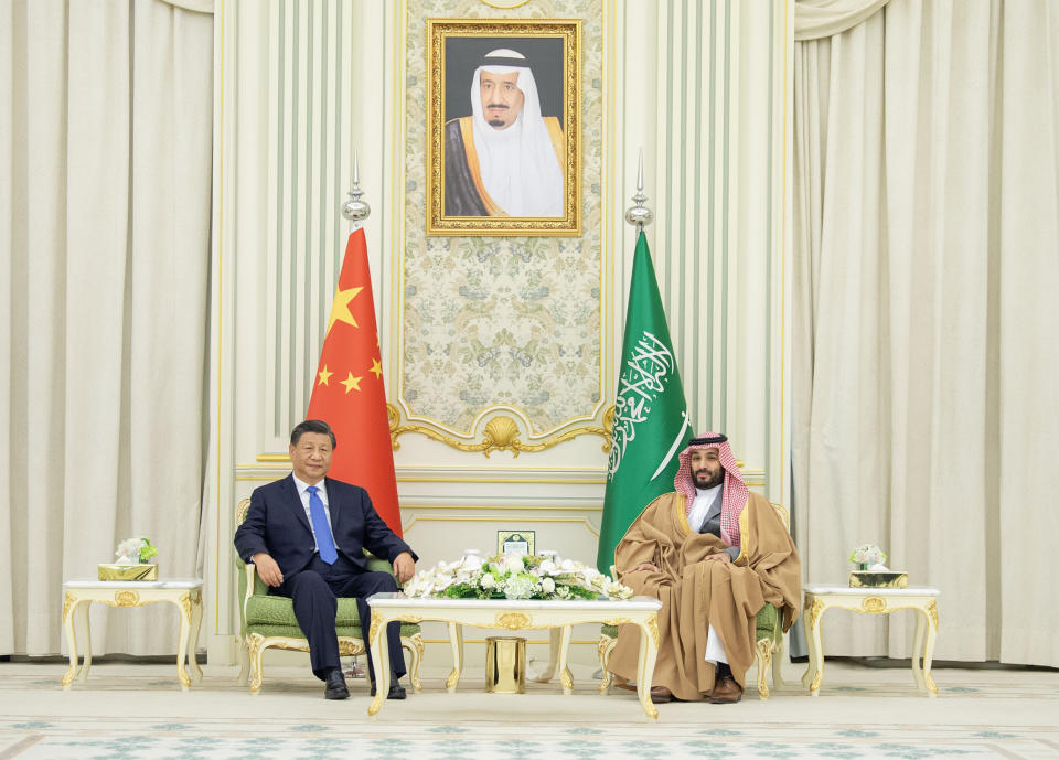 RIYADH, SAUDI ARABIA - DECEMBER 8: (----EDITORIAL USE ONLY â MANDATORY CREDIT - 'ROYAL COURT OF SAUDI ARABIA / HANDOUT' - NO MARKETING NO ADVERTISING CAMPAIGNS - DISTRIBUTED AS A SERVICE TO CLIENTS----) Chinese President, Xi Jinping (L) meets by Crown Prince of Saudi Arabia Mohammed bin Salman Al Saud (2nd R) following an official welcoming ceremony at the Palace of Yamamah in Riyadh, Saudi Arabia on December 8, 2022. Chinese President Jinping is in Saudi Arabia to attend China-Arab States Summit and the China-Gulf Cooperation Council (GCC) Summit. (Photo by Royal Court of Saudi Arabia/Anadolu Agency via Getty Images)