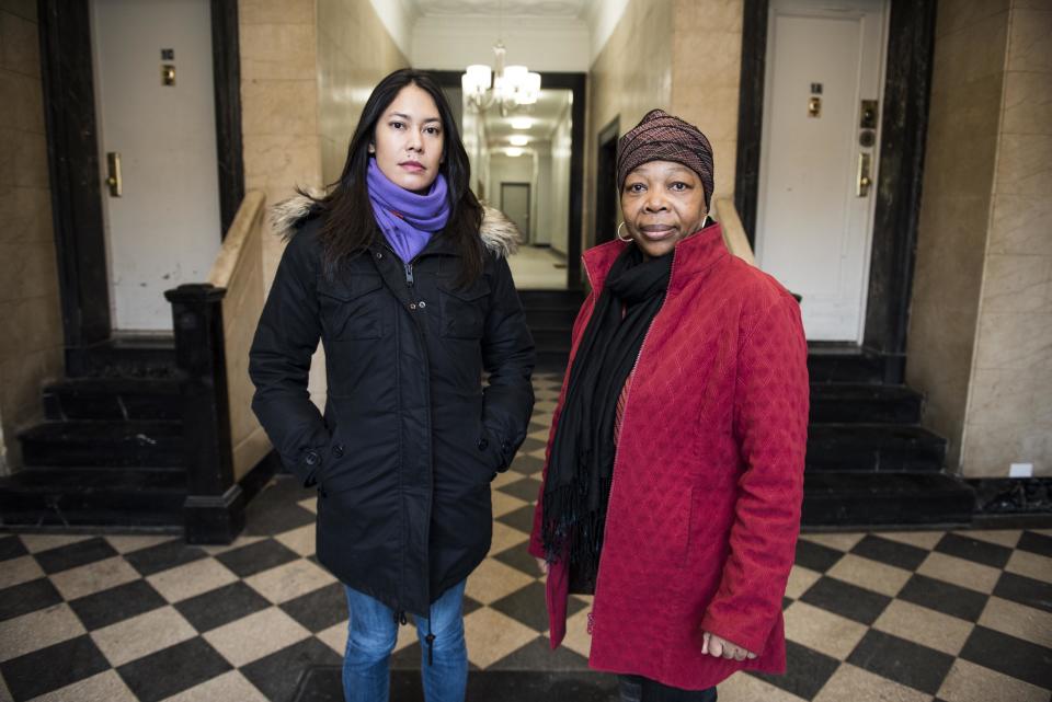 Dara Soukamneuth and Clentine Fenner inside the lobby of their apartment building in Crown Heights, Brooklyn, on Jan. 13, 2018. The two&nbsp;women are members of the building's tenant union, which advocates for safe and healthy living conditions. (Photo: Damon Dahlen/HuffPost)