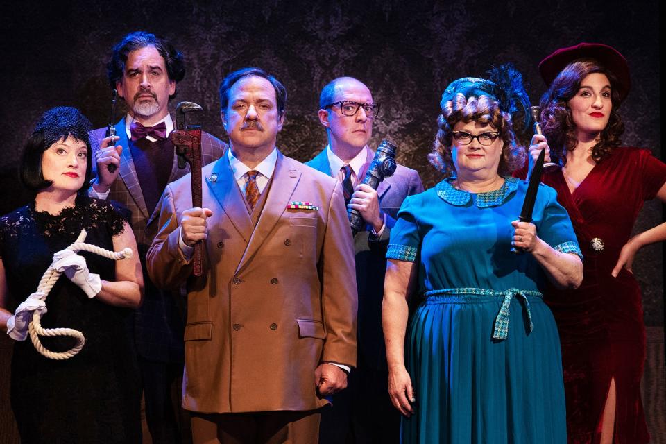 The cast of colorful characters from "CLUE" include Mrs. White (Virginia Nelson Vowell Eberting), Professor Plum (David Snow), Colonel Mustard (Jeffrey Eberting), Mr. Green (Rollin Prince), Mrs. Peacock (Robbin Paige Sharp), and Miss. Scarlet (Casey Maxwell). The play opens May 5 at the Oak Ridge Playhouse.