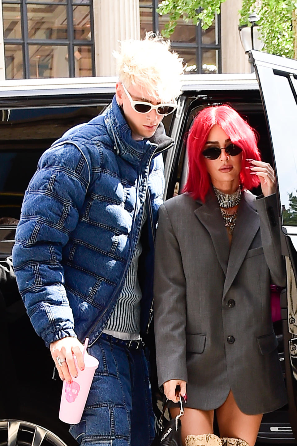 MGK and Megan Fox exiting a vehicle