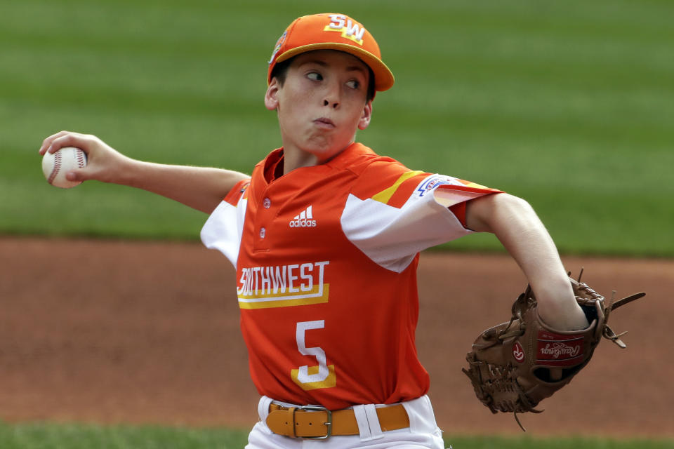 River Ridge, Louisiana's William Andrade delivers during the first inning of the United State Championship baseball game against Wailuku, Hawaii, at the Little League World Series tournament in South Williamsport, Pa., Saturday, Aug. 24, 2019. (AP Photo/Gene J. Puskar)