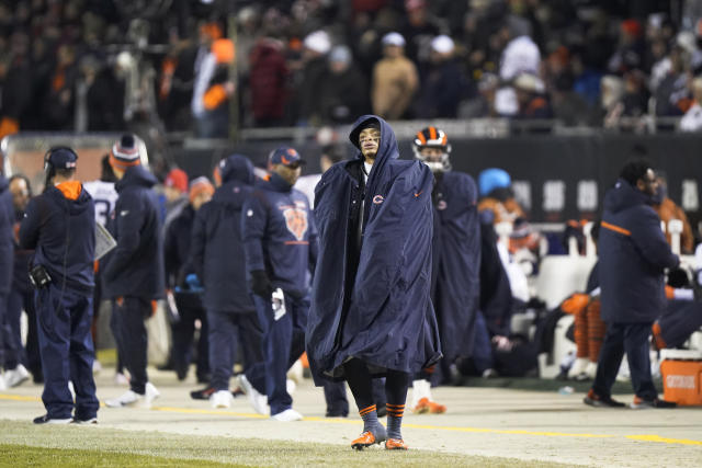 CHICAGO, IL - DECEMBER 20: Chicago Bears quarterback Justin Fields (1)  throws the football during a game between the Chicago Bears and the  Minnesota Vikings on December 20, 2021, at Soldier Field