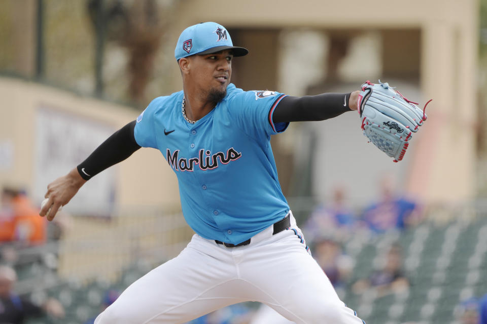 FILE - Miami Marlins starting pitcher Eury Perez throws during the first inning of a spring training baseball game against the New York Mets Saturday, March 2, 2024, in Jupiter, Fla. Pérez will undergo Tommy John surgery and miss the 2024 season, the team announced Thursday, April 4, 2024. (AP Photo/Jeff Roberson, File)