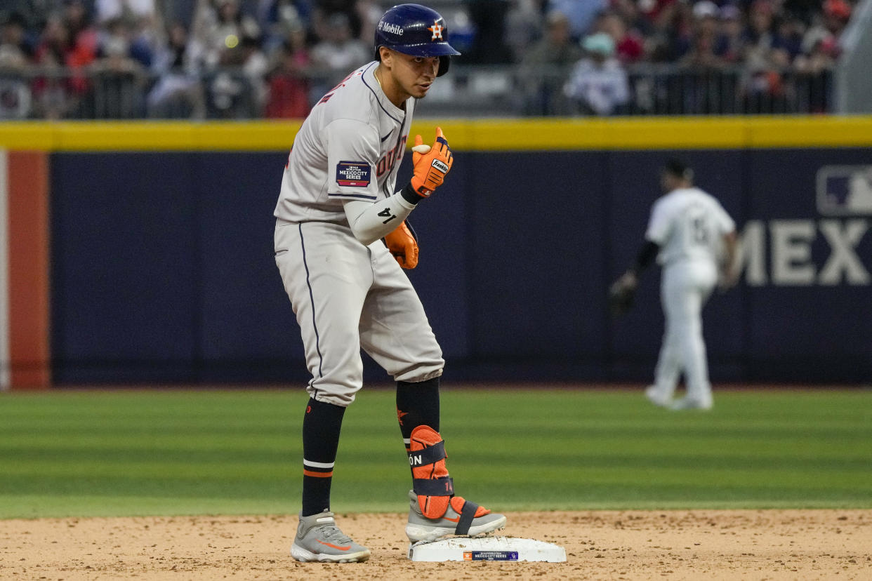 Houston Astros Mauricio Dubón celebrates after connecting a double against the Colorado Rockies during the ninth inning of a baseball game at Alfredo Harp Helu stadium in Mexico City, Saturday, April 27, 2024. (AP Photo/Fernando Llano)