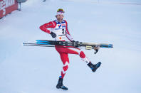 <p>Alex Harvey celebrates with a little air guitar after taking home gold in the 50-kilometre freestyle race at the 2017 cross-country skiing world championships, becoming the first North American do so since 1925. (Nils Petter Nilsson/Getty Images) </p>