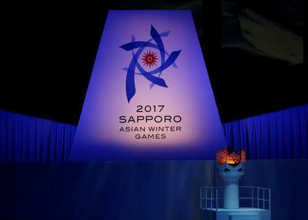 Asian Winter Games - Opening ceremony - Sapporo Dome - Sapporo, Japan - 19/02/17 - The flame is seen in the cauldron during the opening ceremony. REUTERS/Issei Kato