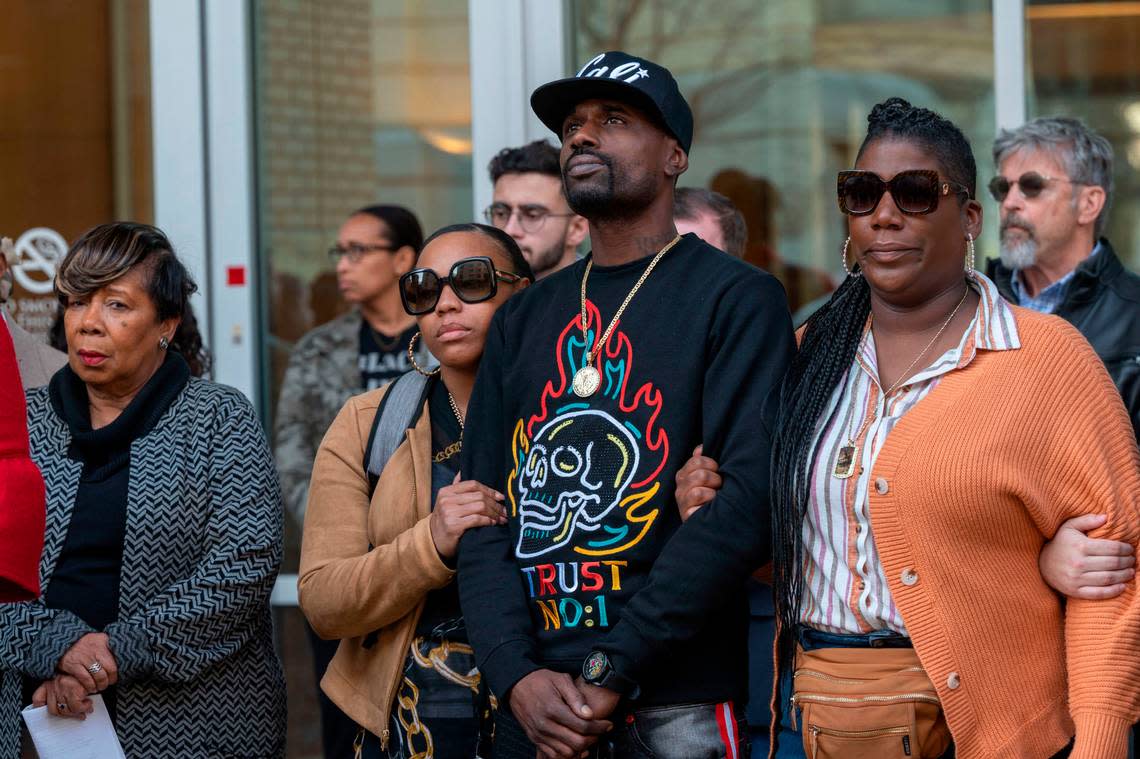 Family members of Tyre Nichols, including sister Keyana Dixon, right, stand with Betty Williams, left, president of the greater Sacramento branch of the NAACP, along with other organizations, during a press conference at City Hall on Friday for the killing of former Sacramento resident Tyre Nichols. Nichols died on Jan. 10 after being beaten by Memphis law enforcement officers.