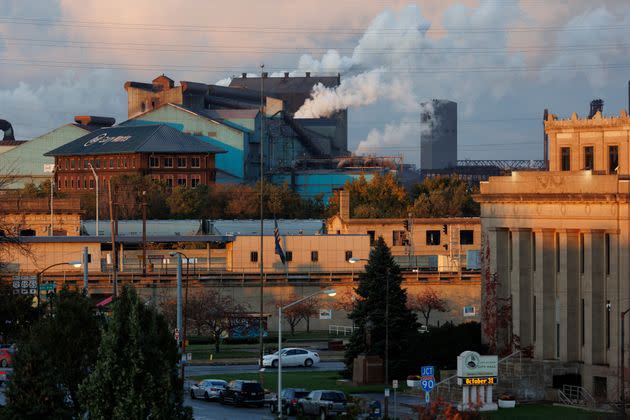 Smoke rises from the U.S. Steel Corp.'s factory by the Gary Metro Center tracks in Gary, Indiana, on Oct. 31. To the right is City Hall.