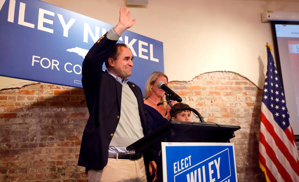 Wiley Nickel acknowledges the crowd as he prepares to speak at his campaign party at Sitti in Raleigh, N.C., Tuesday, Nov. 8, 2022.