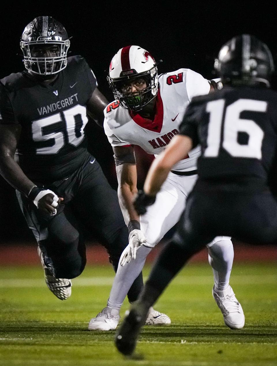 Manor running back Titus Petteway had trouble escaping Vandegrift's tough defense, including Jacob Henry, giving chase, and Jack Huerkamp on Friday night. The Vipers won the district game 51-6.