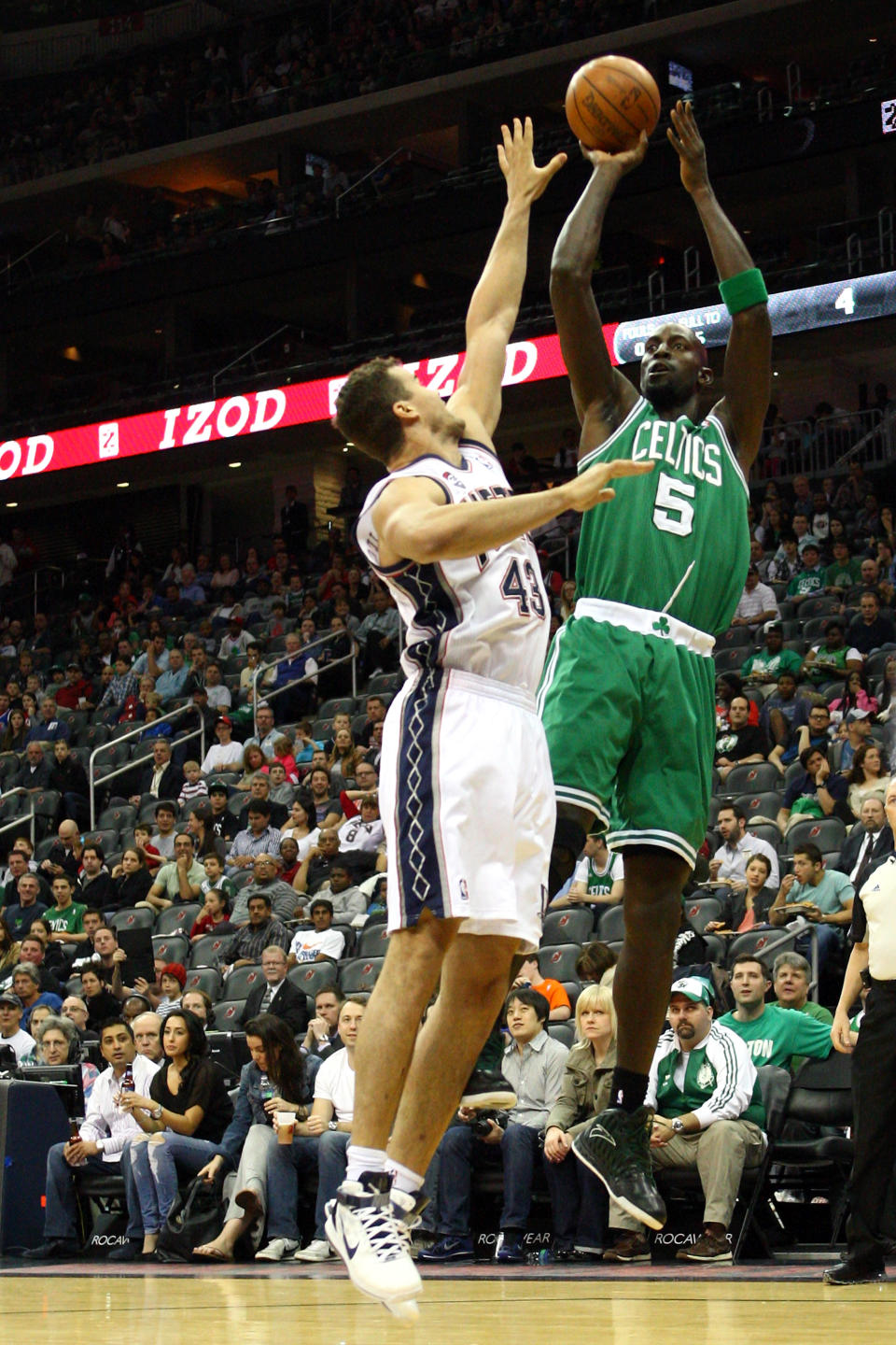 NEWARK, NJ - APRIL 14: Kevin Garnett #5 of the Boston Celtics attempts a shot in the first half against Kris Humphries #43 of the New Jersey Nets at Prudential Center on April 14, 2012 in Newark, New Jersey. NOTE TO USER: User expressly acknowledges and agrees that, by downloading and or using this photograph, User is consenting to the terms and conditions of the Getty Images License Agreement. (Photo by Chris Chambers/Getty Images)