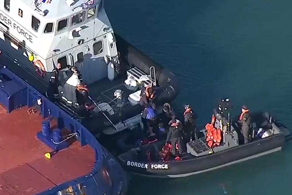 Suspected migrants have been brought to shore at Dover by Border Force officials. (Sky News)