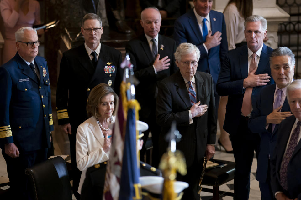 Speaker of the House Nancy Pelosi, D-Calif., Senate Minority Leader Mitch McConnell, R-Ky., and House Minority Leader Kevin McCarthy, R-Calif., stand together as they attend a Congressional Gold Medal ceremony to honor members of the Merchant Marine who served in World War II, at the Capitol in Washington, Wednesday, May 18, 2022. (AP Photo/J. Scott Applewhite)