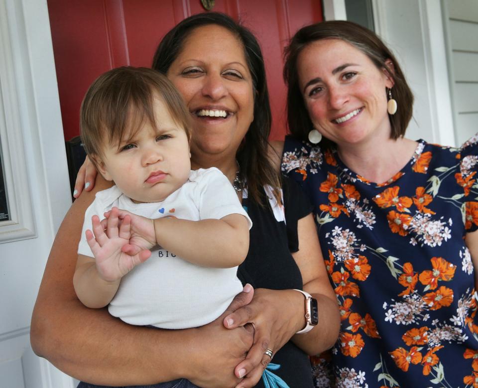 Priya Greene, left, had rare, almost deadly reaction to IVF treatment and her neighbor, Libby Vardaro became her surrogate to bring Riya into the world.