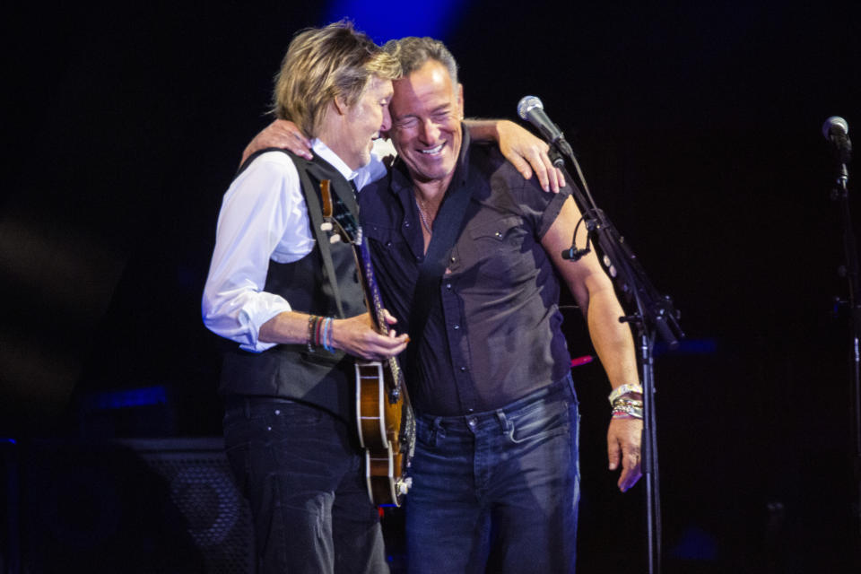 Paul McCartney, left, and Bruce Springsteen perform at Glastonbury Festival in Worthy Farm, Somerset, England, Saturday, June 25, 2022. (Photo by Joel C Ryan/Invision/AP)