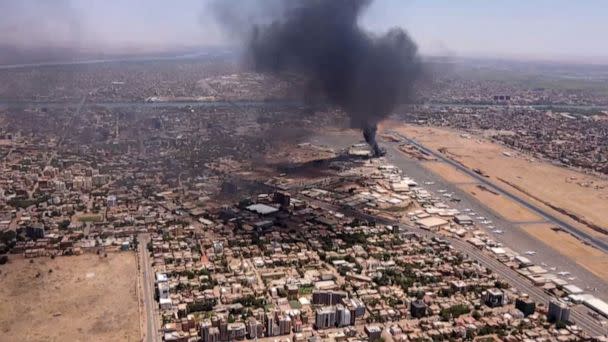 PHOTO: An aerial view of black smoke rising above the Khartoum International Airport in Khartoum, Sudan on April 20, 2023. (AFP via Getty Images)